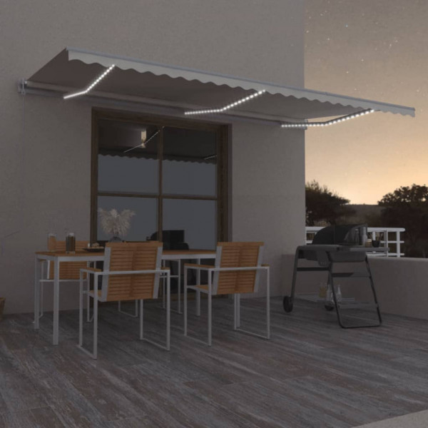 Toldo automático con LED sensor de viento crema 600x350 cm D